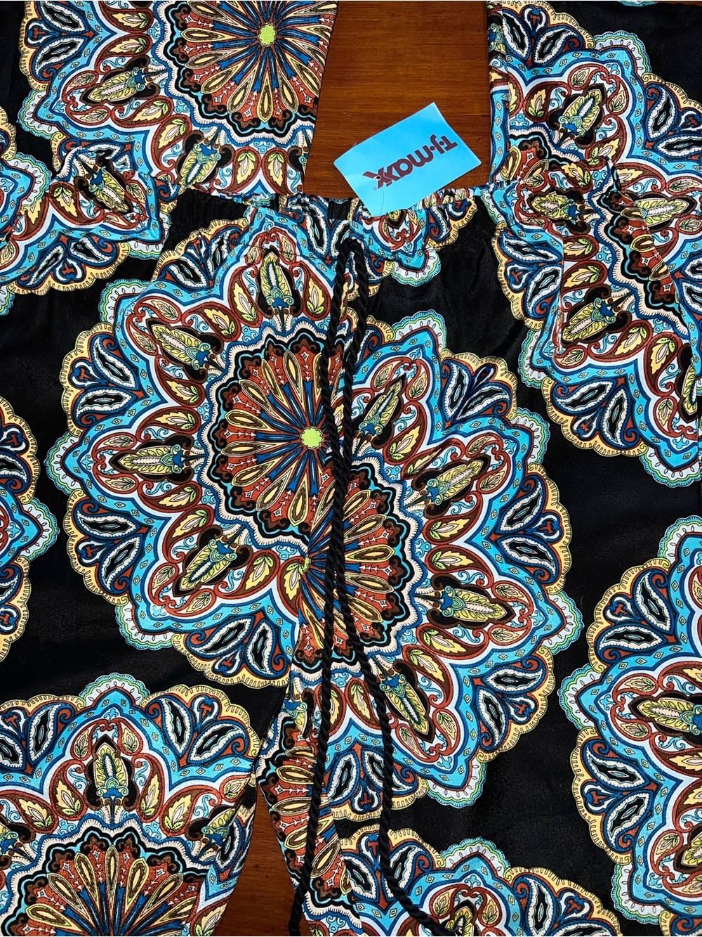 Band of Gypsies Black bell flares with Teal, Orange and Brown Mandala Motif